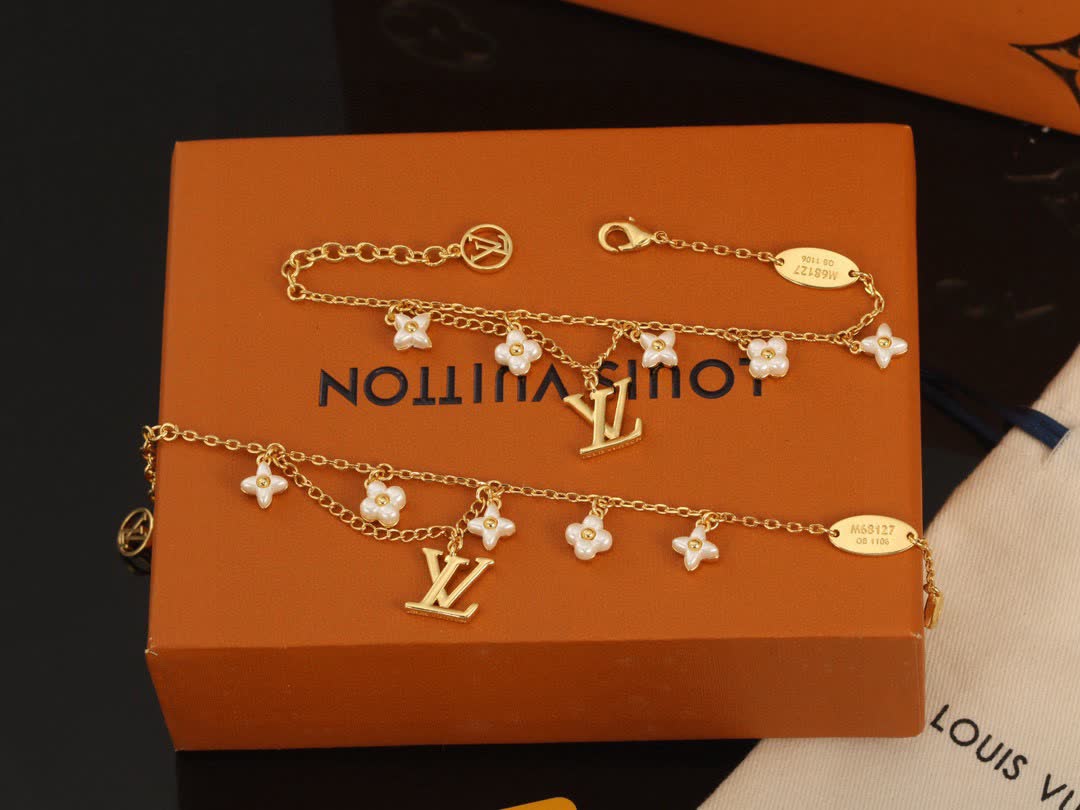 Louis Vuitton Gold Tone Bracelet with Pearls and Logo